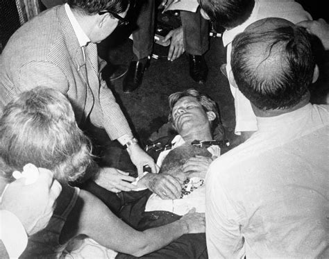 pictures of robert kennedy escorting jackie from the hospital The front of the shirt worn by President Kennedy on day of his assassination